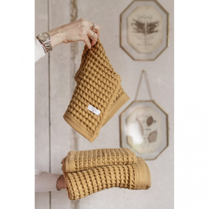Coppia Asciugamani a Nido d'Ape Sweet Waffle Collection 30x50 + 50x90 cm. Ocra